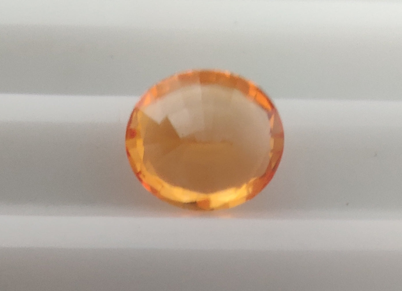Heated Natural Orange Sapphire Oval Cut 0.74 Carats, Sri Lanka