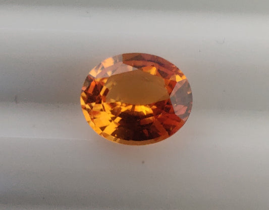 Heated Natural Orange Sapphire Oval Cut 0.74 Carats, Sri Lanka