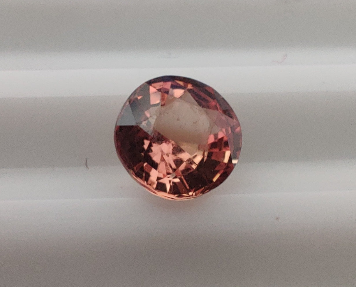 Heated Natural Orange Pink Padparadscha Circle Cut 0.71 Carats, Sri Lanka