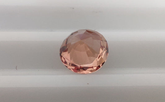 Heated Natural Orange Pink Padparadscha Circle Cut 0.71 Carats, Sri Lanka